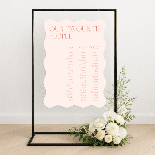 Modern semi-custom wedding seating chart on die-cut foamboard with personalised colours and layout, styled for an elegant reception setup.