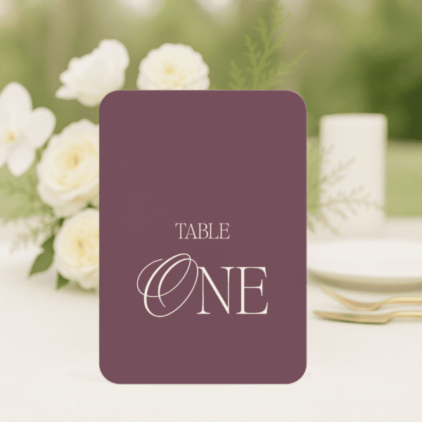 So Chic wedding table number in rounded corners shape featuring romantic, modern fonts and soft colour palette, styled for an elegant reception table.