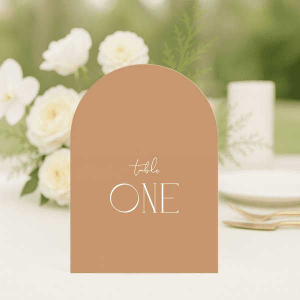 Ellie wedding table number in arch shape featuring romantic, modern fonts and soft colour palette, styled for an elegant reception table.