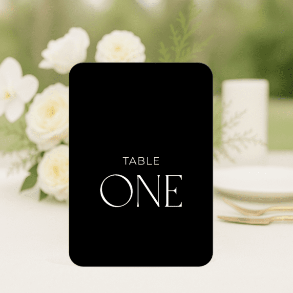 Beloved wedding table number in arch shape featuring romantic, modern fonts and soft colour palette, styled for an elegant reception table.